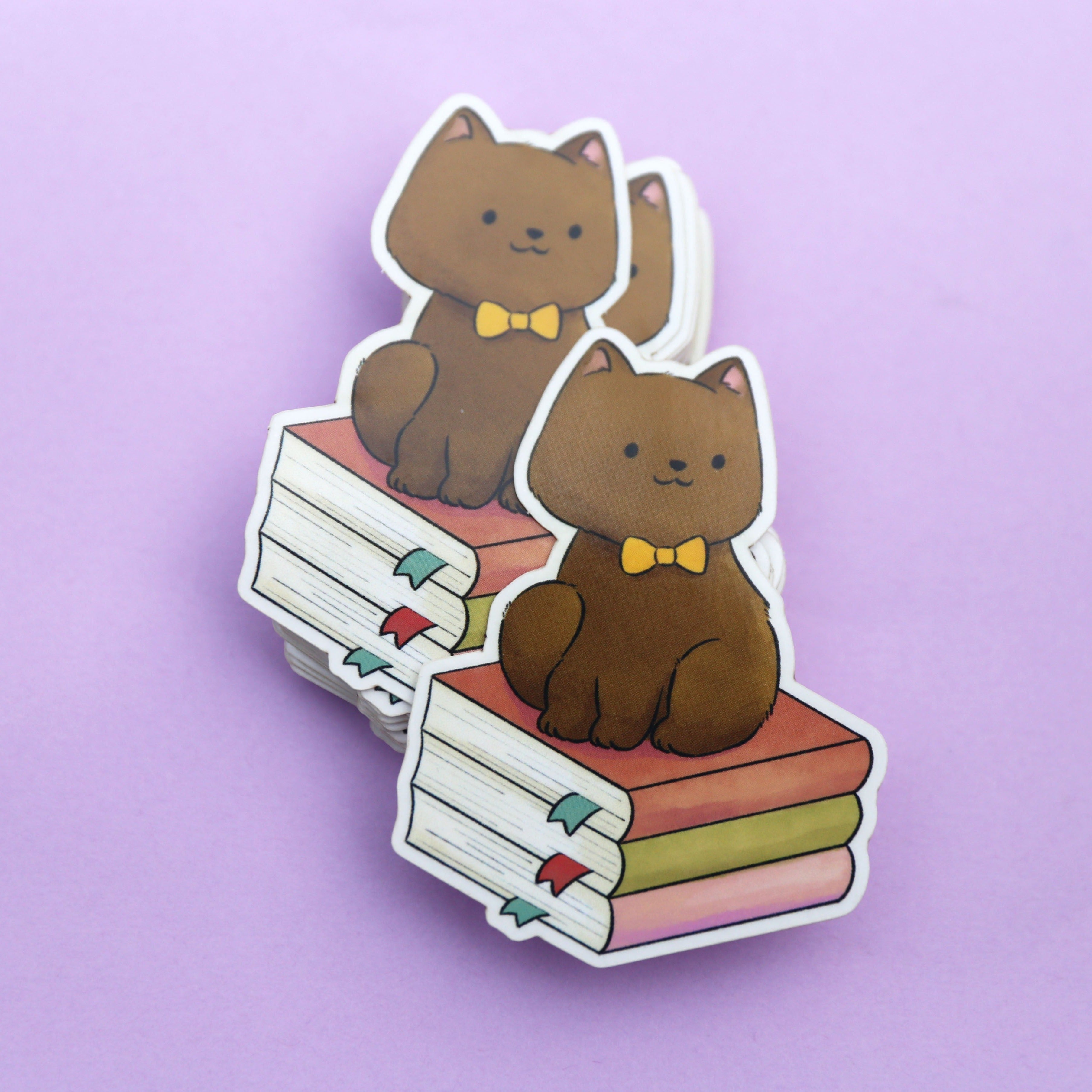 Cat Sitting on Books Transparent Vinyl Sticker